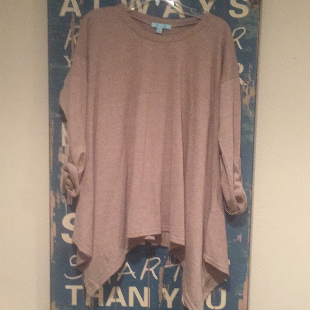 Comfortable, unique top only worn a couple times.